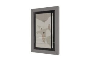 Moleskine studio notebook version 1.0.0 in a gray frame, artwork by jon koko