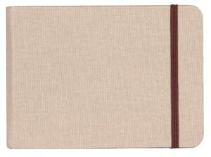 A clairefontaine goldline sketchbook, version 1.0.0, with a textured cover and elastic band