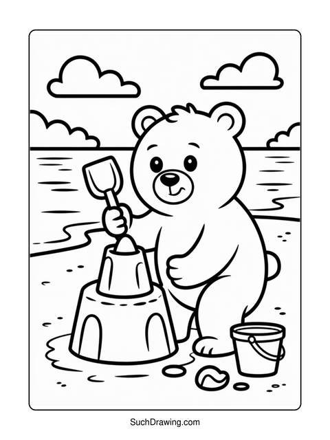 A bear building a sandcastle on the beach with a shovel and bucket
