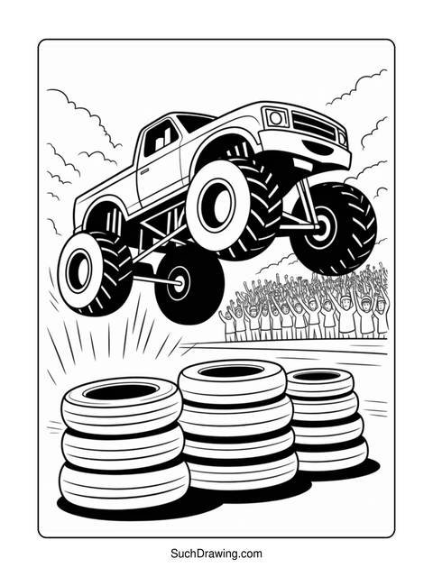 A monster truck jumping over tires with an audience cheering in the background